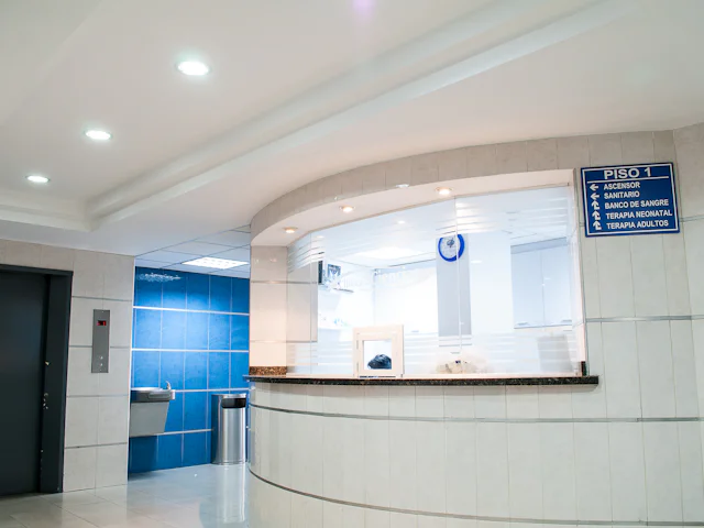 Clean medical clinic corridor with seamless resilient flooring