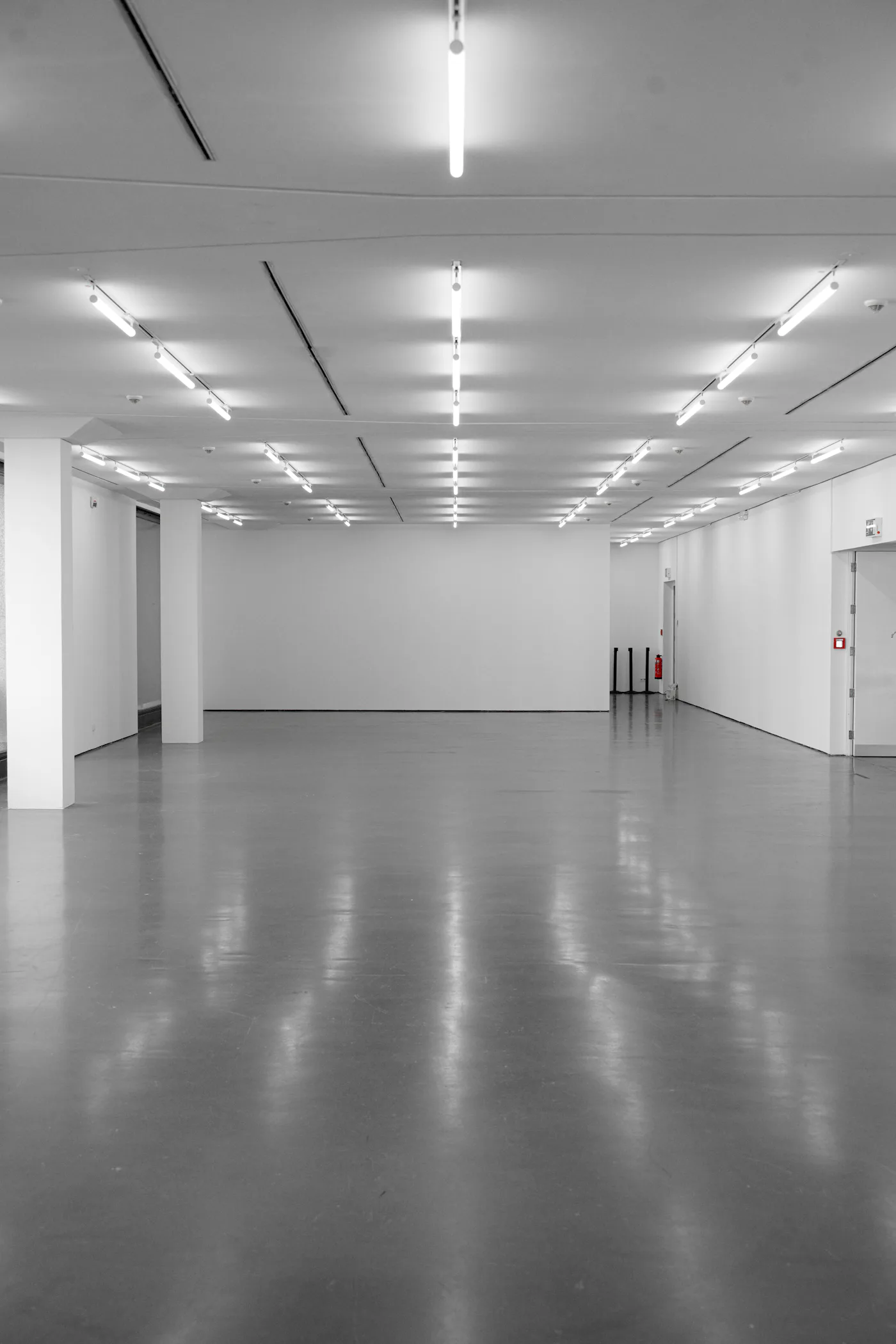 Polished concrete floor with a reflective finish in a commercial interior